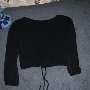 black sweater with strings